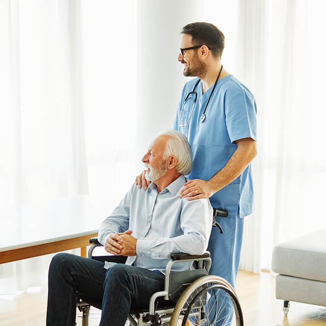 Caregiver Comforting Resident at Memory Care Facility